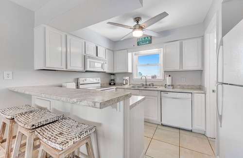 Fort Morgan Condo | Recently renovated condo w/gulf views, decks, balcony, shared outdoor pool, a/c