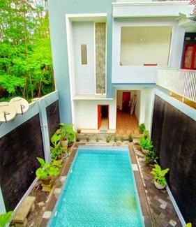 Banjarasri Hotel | RedDoorz At Artomoro Guest House