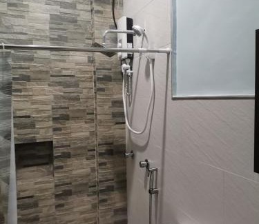 Mambajao Hotel | RedDoorz at Gracia's Calzada Inn Camiguin