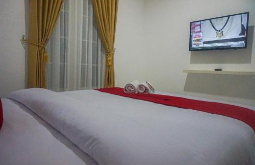 Genitri Hotel | RedDoorz near Araya Family Club House