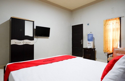 Palu Hotel | RedDoorz near Mutiara SIS Al Jufrie Airport Palu