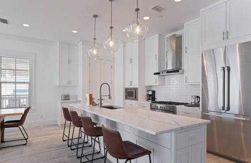 Panama City Beach House | Reel Em Inn | Beachfront Luxury Estate | Heated Pool | Beautiful Weddings
