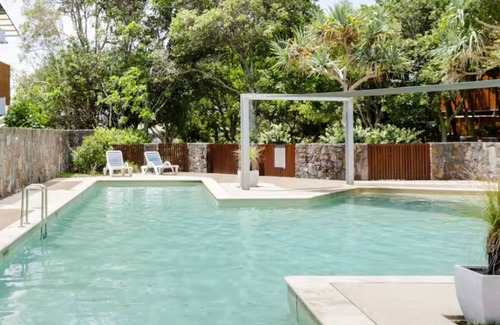 Twin Waters Apartment | Reflections across the waters and resort access