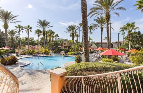 Davenport House | Regal Palms 4-bedroom Townhome close to Disney. Lazy River, Water Slide.