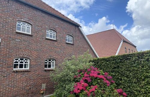 Strackholt Apartment | Reihenhaus in Strackholt mit beheiztem Pool, cleaning included