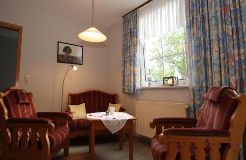 Strackholt Apartment | Reihenhaus in Strackholt mit beheiztem Pool
