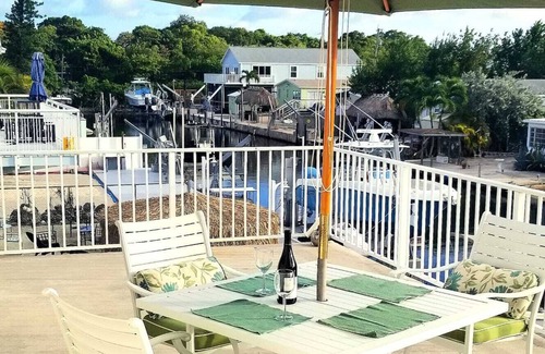 Sexton Cove Estates House | Relax and Play in Paradise - Keys Stilt Home on canal with Bay Access