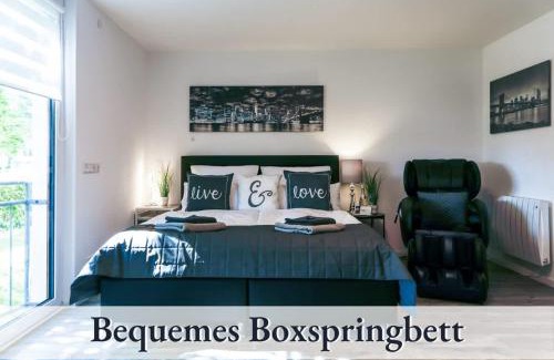 Bergerhausen Apartment | Relax-Apartment Biberach - Relax Massagesessel - Smart-TV 85 Zoll - voll ausgestattete Küche - High-Speed Internet - Arbeitsplatz mit Curved Monitor