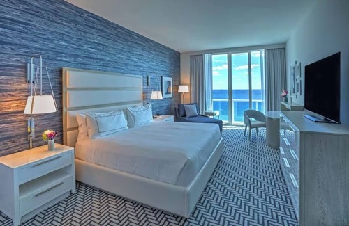 Central Beach Hotel | Relax at Coastal Stay Near Water Sports, Jungle Queen Cruises, Dining, and Bars
