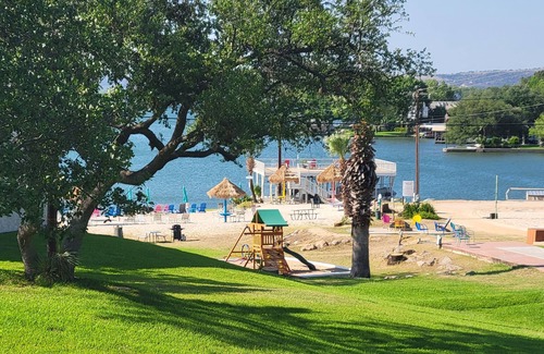 Granite Shoals Condo | Relax at Lake LBJ condo-balconey w Lake View/Sandy Beach/Great Swim area
