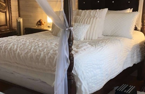Antlers House | Relax at our unique boutique hotel with a spa, soaking tub, sauna and Speakeasy.