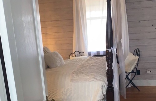 Antlers House | Relax at our unique boutique hotel with a spa, soaking tub, sauna and Speakeasy.
