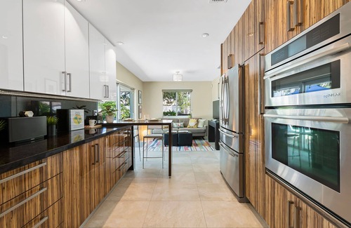 Imperial Point House | RELAX AT SERENITY PLACE, A STUNNING MODERN & CONTEMPORARY HEATED POOL HOME!