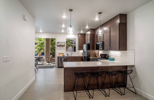 St. George House | Relax in a 4BR, 3.5BA St. George townhouse near Zion! Pool, hot tubs, balconies | Pet-friendly!