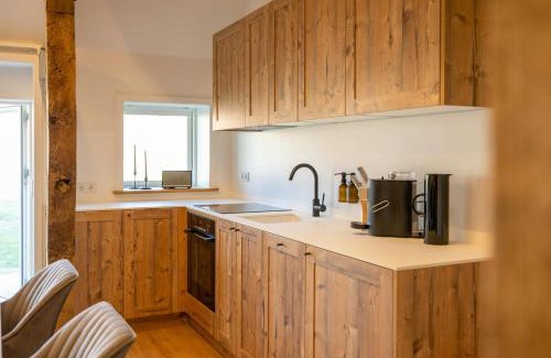 Ratekau House | Relax In A Thatched Barn With A Sauna