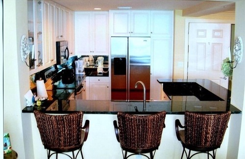 Gulf Lagoon Beach Condo | Relax in luxurious Vintage Hawaiian Decor at A Soleil Condo