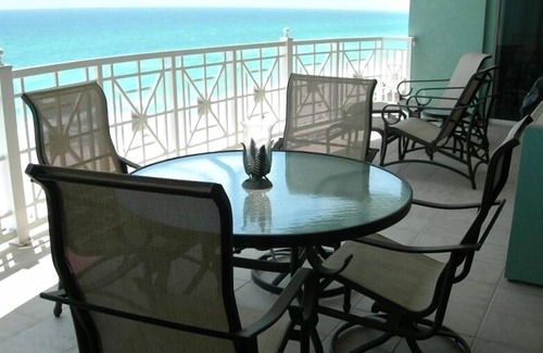 Gulf Lagoon Beach Condo | Relax in luxurious Vintage Hawaiian Decor at A Soleil Condo