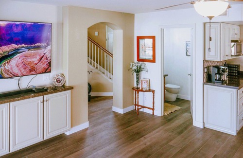 Avondale House | Relax in private heated hot tub or just bask in the sun by the pool.