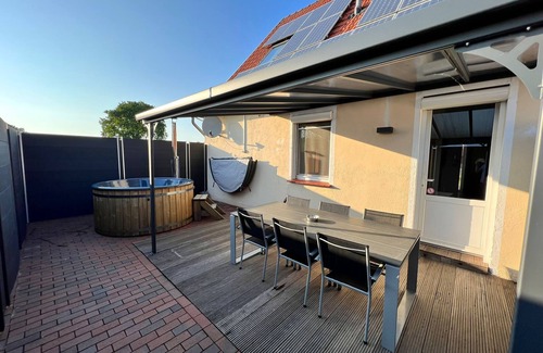 Neuborger House | Relax in the pool, whirlpool, sauna or wood-fired hot tub.