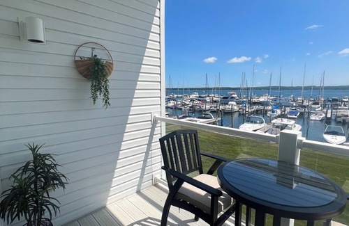 Charlevoix Condo | Relax in this beautiful condo on Lake Charlevoix!
