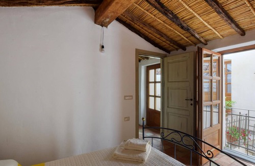 Oliena Apartment | Relax in your cozy apartment in the heart of historic Oliena.