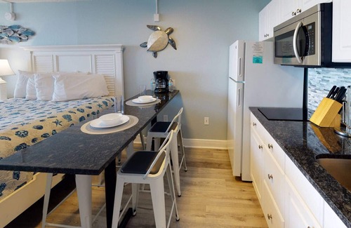 Treasure Island Condo | Relax on Your Private Beachfront Balcony. Fresh and Comfortable. Great Family Value!