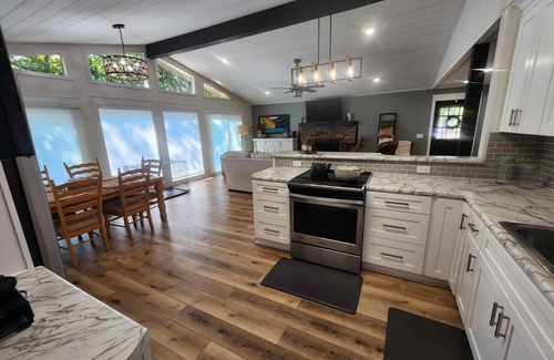 Eden Isle House | Relax & Recharge at The Nest – Lake Escape with Outdoor Fireplace & Hot Tub