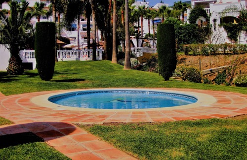 Oasis del Capistrano Apartment | Relax.south facing terrace, all day sun, views of tropical gardens and pools