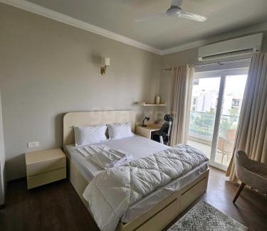 Gurugram Apartment | Relaxing 1BHK Retreat with Pool View