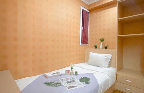 Pekayon Jaya Apartment | Relaxing 2BR with Pool View Mutiara Bekasi Apartment By Travelio