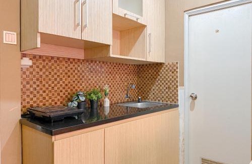Pekayon Jaya Apartment | Relaxing 2BR with Pool View Mutiara Bekasi Apartment By Travelio
