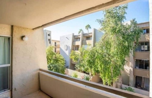 Entertainment District Condo | Relaxing Condo w/free parking - Just a 5 Min Drive to Old Town!