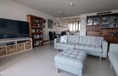 Maroochydore Apartment | Relaxing Escape: Pool, Tennis Court, Garden Terrace & Water Views