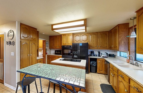 New Braunfels House | Relaxing riverfront home tucked away with shaded back deck/patio