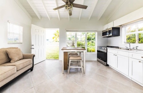Bottle Creek Apartment | Relaxing Stay: Kitchen, Balcony & Beach Steps Away