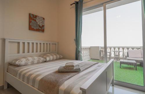 Al Hamra Village Apartment | Relaxing, Swimming and Golfing in Al Hamra Village