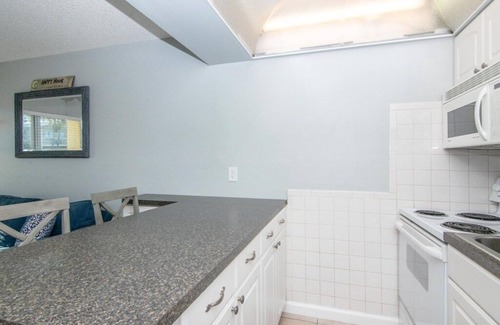 Sunset Beach Condo | Relaxing Treasure Island Condo Steps From Beach, Watch Sunset From Your Balcony!