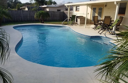 Titusville House | Relaxing Tropical Pool Home Close to Beach and Disney