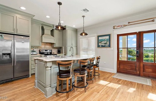 Shoreline Park House | Relaxing Waterfront Getaway with Pool, Boat Dock, and Ice House next door.