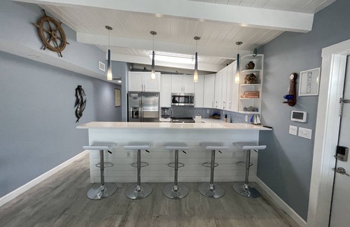 Key Colony Beach House | Remodeled 3 bedroom 2 bath on 200 foot wide canal with Cabana Club membership.