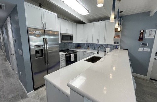 Key Colony Beach House | Remodeled 3 bedroom 2 bath on 200 foot wide canal with Cabana Club membership.