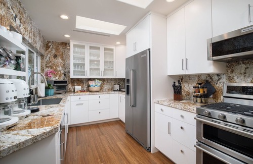 Halama Street House | REMODELED BEACHFRONT ESTATE, MAGNIFICENT MANGO SURF