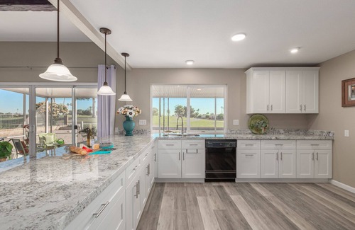 Sun City House | Remodeled designers home with sunrises and sunset views on Palm Brook Golf !