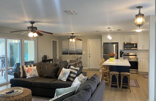 Yacht Club House | Remodeled gulf access home with amazing views and private cage enclosed pool.