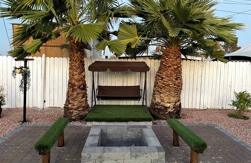 North Las Vegas House | Remodeled Home with Lush Landscapes, King Beds, BBQ, Games, Workspace and More!