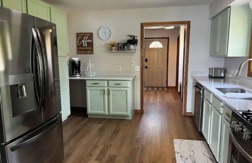 Wolf Lake House | Remodeled Lake House Featuring Sauna, Sleeps 12