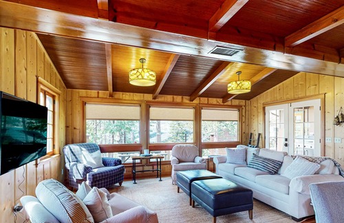Bass Lake Cabin | Remodeled lake-view home with private dock, fireplace, outdoor shower, deck, AC