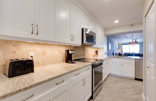Marco Island Condo | Remodeled - Luxurious Direct Beachfront Somerset Condo-with Den sleeping area