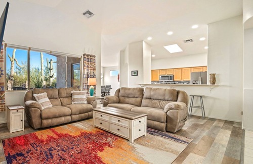 Dove Mountain House | Remodeled modern beauty backs to open desert with mountain views & home theatre