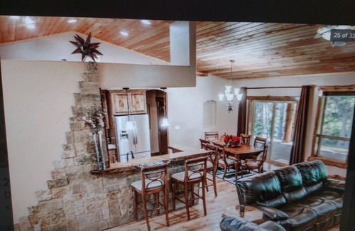 Tamarack Resort Cabin | REMOTE CABIN WITH HOT TUB, MOVIE THEATER AND HUGE COVERED DECK WITH FIRE TABLE
